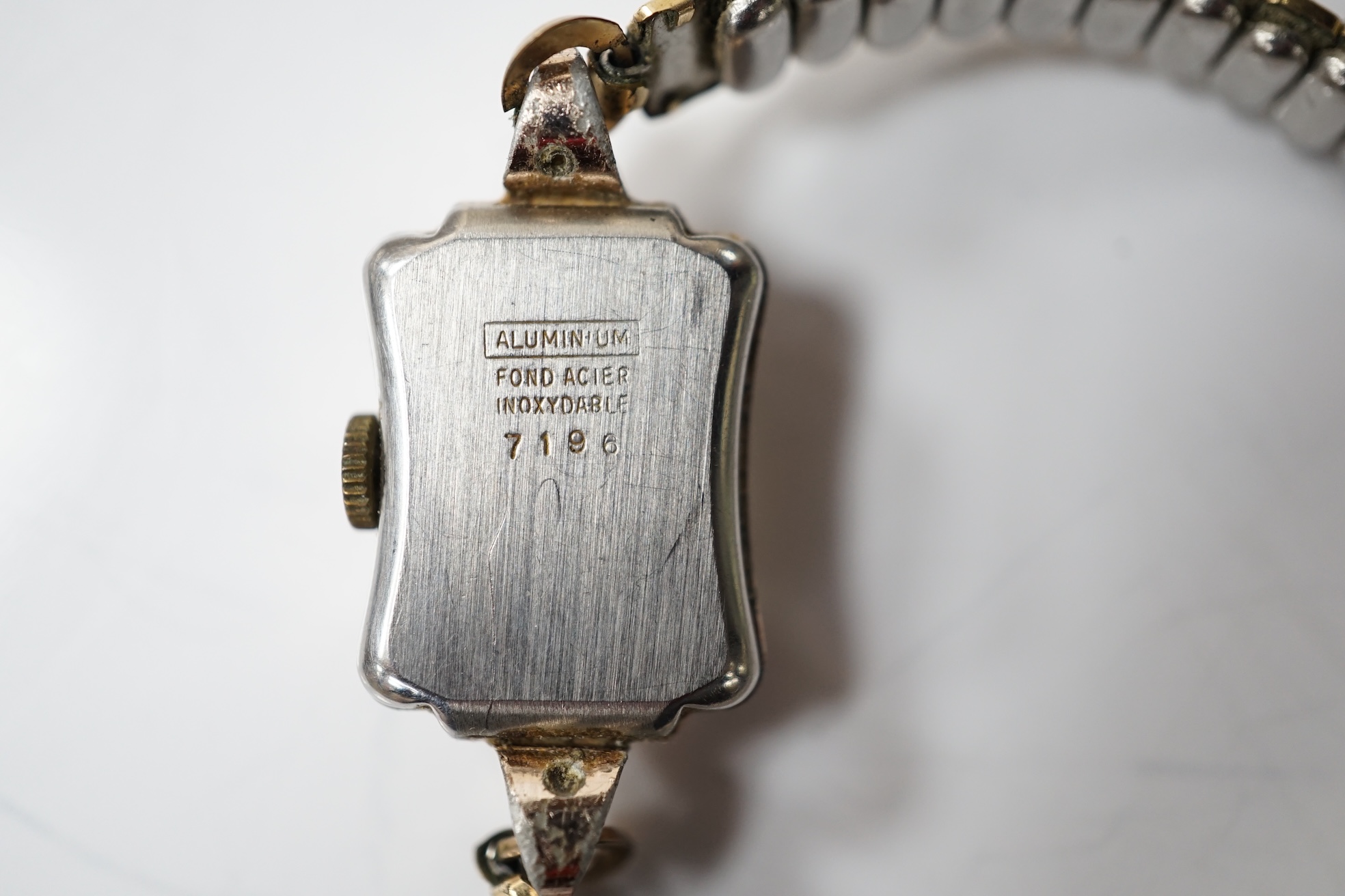 A lady's modern 925 Quinn wrist watch, with heavy silver curb link bracelet and two other wrist watches including a Smiths Empire. Condition - poor to fair